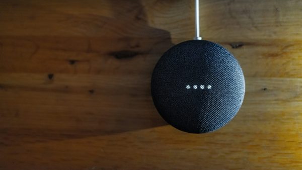 Smart Home Security blue ball on a wooden surface