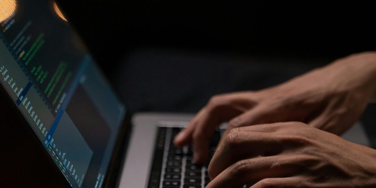 Dark Web Data Removal person-using-silver-and-black-laptop-computer