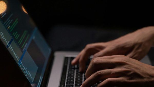 Dark Web Data Removal person-using-silver-and-black-laptop-computer