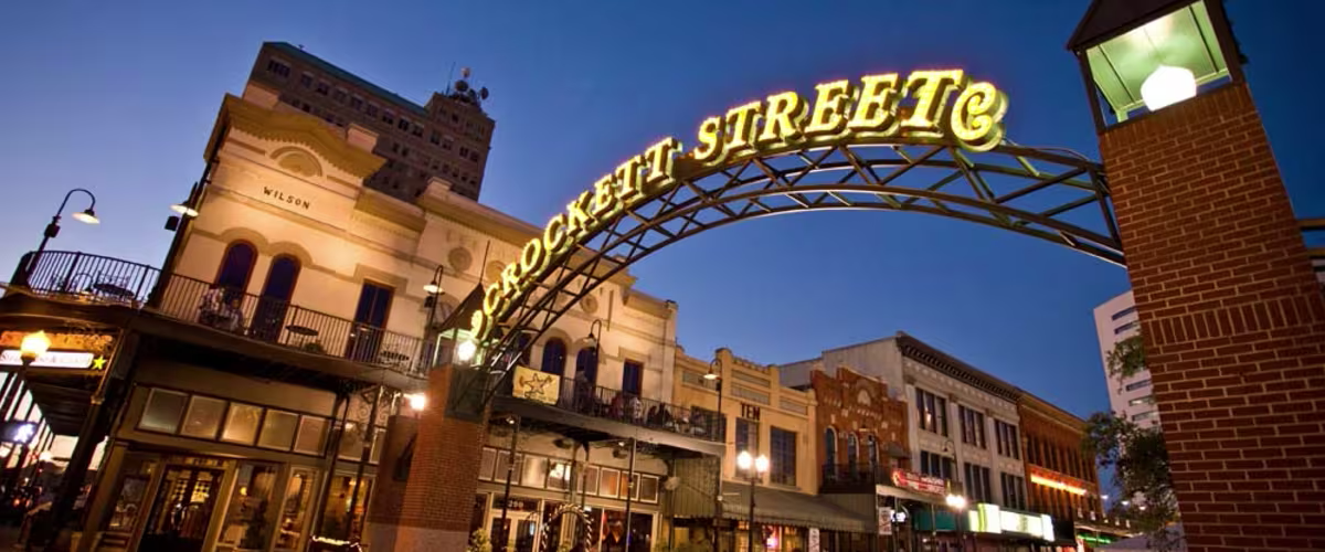 Historic street sign at dusk