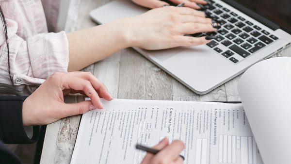 Cyber Insurance a-person-typing-on-laptop