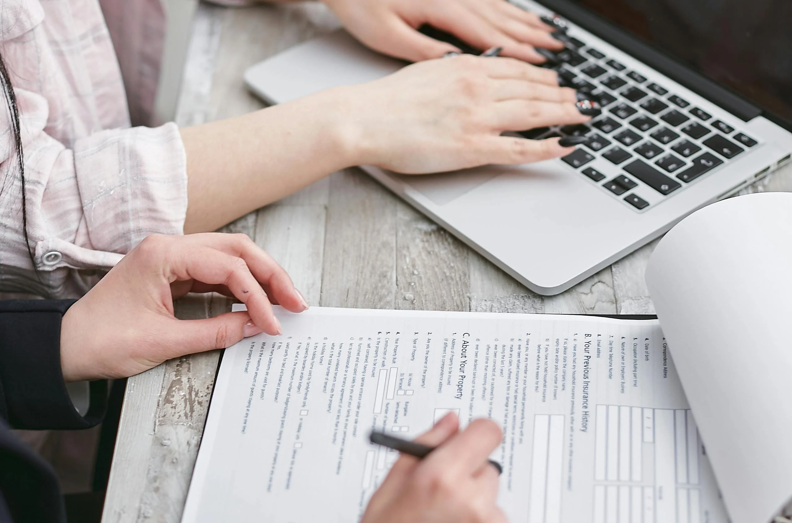 Cyber Insurance a-person-typing-on-laptop