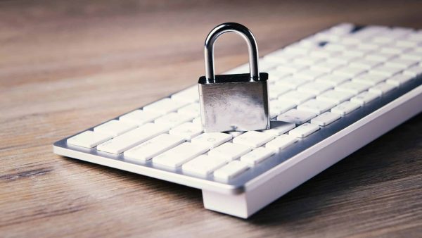 2025 privacy compliance checklist a computer keyboard with a padlock on top of it